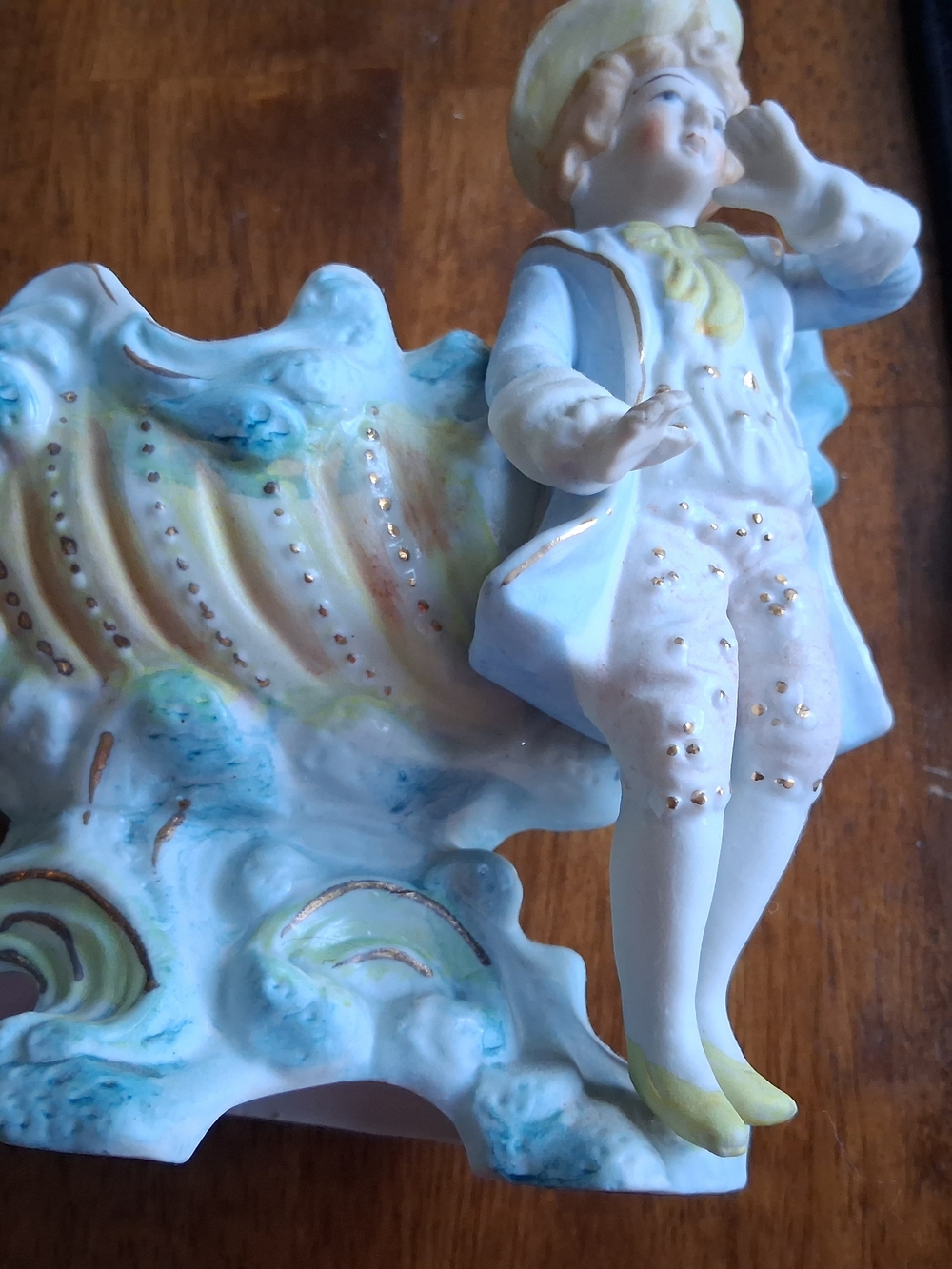 Vintage Porcelain Cherub Figurine in Blue, Cream, and Yellow